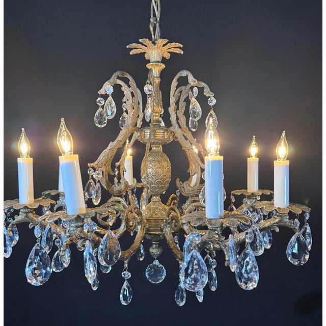 Vintage Spanish Brass Chandelier with 8 Lights & Faceted Crystals Gracefully crafted in Spain, this elegant vintage...