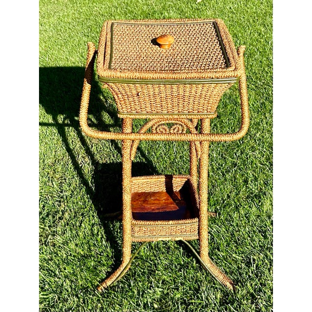 A beautiful, rattan-woven, Victorian stand, dated to the 1880’s—weighing a mere 3.3lbs! It has a lidded top to deter...