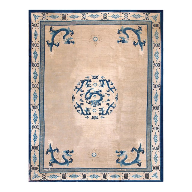 Exceptional Ivory and Blue Color With Dragon Design Antique Chinese Peking Rug For Sale