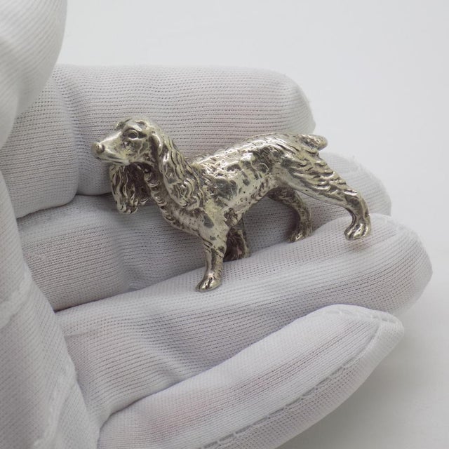 Compact vintage sculpture depicting a Cocker Spaniel dog, handmade in Italy between the 1960s and 1970s in genuine solid...