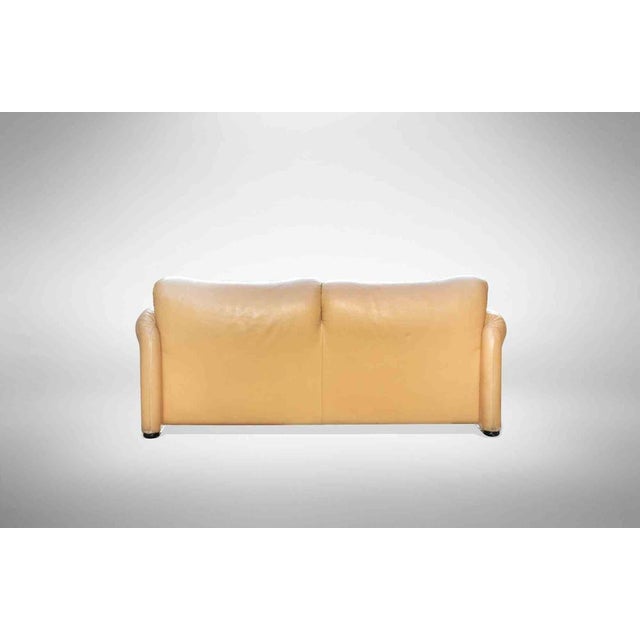 Pair of Maralunga sofas is an original and iconic design item designed by Vico Magistretti for Cassina. Yellow leather...