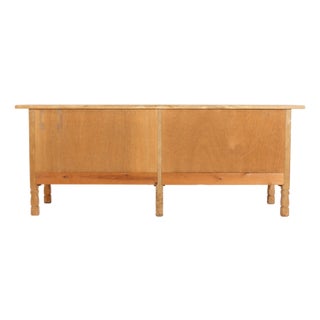 Long Brutalist Danish Oak Sideboard with 4 Doors attributed to Henning Kjærnulf, 1970s For Sale