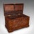 This is an antique celebration chest. An Indian, teak and brass trunk, ideal as an occasional coffee table, dating to the...