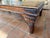 Late 20th Century Late 20th Century Spanish Colonial Revival Rustic Coffee Table W/ Iron Strapwork & Studded Plank Top For Sale - Image 5 of 6