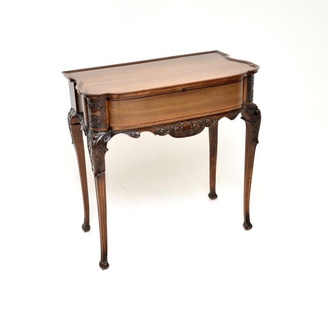 A stunning antique Victorian carved walnut console / side table. This was made in England, it dates from around the...