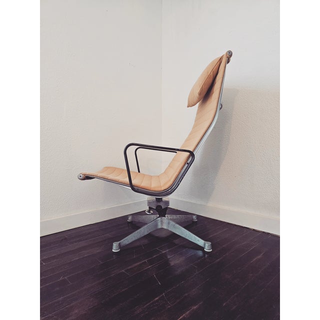 An early example of the Eames Aluminum Group Recliner, designed by Charles and Ray Eames for Herman Miller. Both the chair...