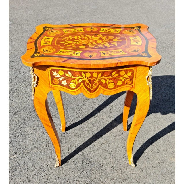 Elegant,Empire, French style Marquetry Inlay side table with gilded bronzes and one drawer. Good for living or bedroom....