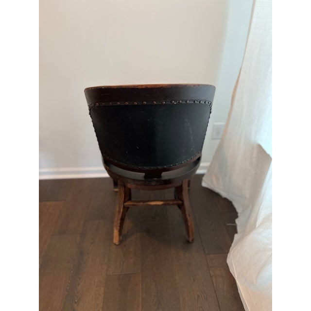 Vintage Marble and Shattuck wood and leather bankers chair. This chair is well loved and shows it's age but that is all...