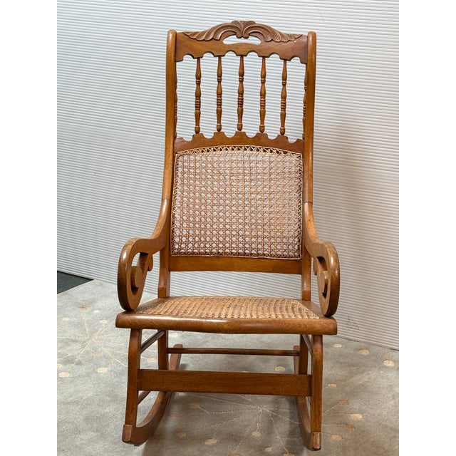 Design Plus Gallery presents a Lincoln Style Rocking Chair from the Early 20th Century. The chair is made from Tiger Oak...
