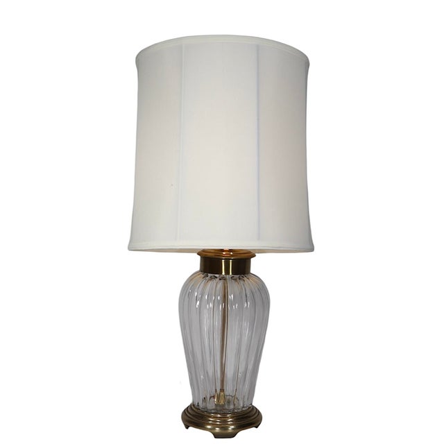 Hollywood Regency style glass and brass table lamp by Frederick Cooper. This stylish table lamp has a blown glass body,...