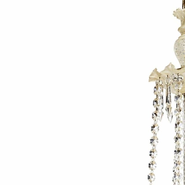 Lighting - Ceiling lamp (120 cm). 20th century Europe; yellow metal structure; column; bobeches and crystal pendants....