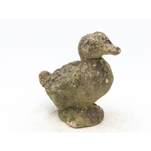 Capture the enchantment of a vintage French garden with this charming duck ornament. Crafted from durable concrete, it...