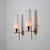 Refined pair of italian wall lights from the 1950s, characterized by a sculptural and well-balanced composition. each...