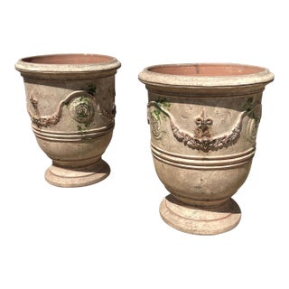 Pair of 31 Inch French Anduze Planters With Antique Patine, Fleur De Lys For Sale
