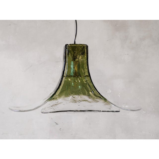 Beautiful flower-shaped Mazzega hanging lamp made of green and transparent Murano glass from the 1960s. This fantastic...