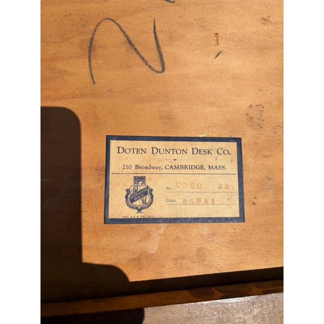 This is a very old desk by high-end commercial furniture company Doten Dunton of Boston. The desk can also be used as a...