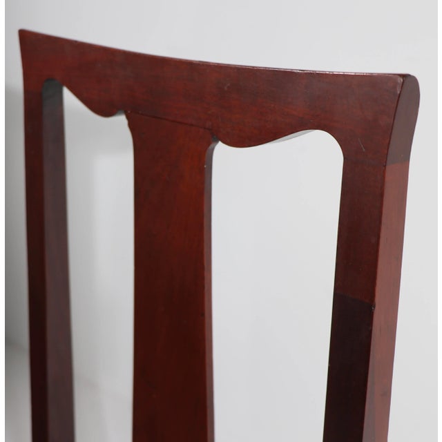 1920's vintage side chair in the Edwardian style, of solid wood with decorative upholstered pas seat. The chair is in very...