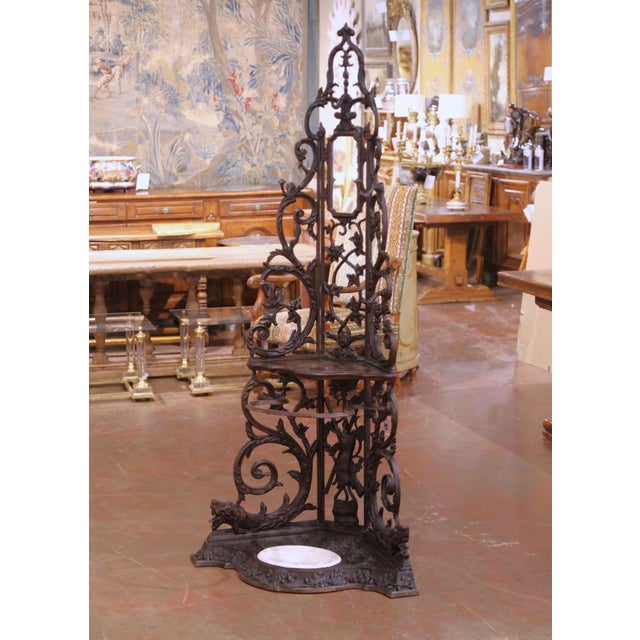 Place this impressive antique corner hall stand in a grand entry, hunting lodge, or mountain retreat. Crafted in France...