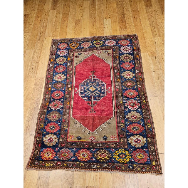 This exquisite late 19th-century Turkish Anatolian village rug is a refined expression of traditional rural weaving,...