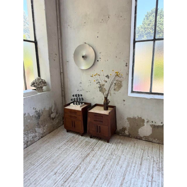 Antique pair of 1940s art deco-style bedside tables, made of oak and oak veneer with their pinkish-hued white marble tops....