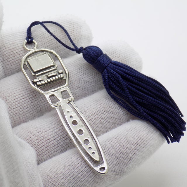 A quirky and nostalgic vintage bookmark inspired by early computer design, handmade in Italy between the 1980s and 1990s...