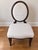 An elegant Oval X-Back Dining Side Chair by Barbara Barry for Baker Furniture, one of Barry’s most recognizable designs...