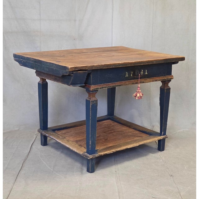 A gorgeous, old eastern European (perhaps Romanian) pine and oak baker's table painted a lovely deep cobalt blue on the...