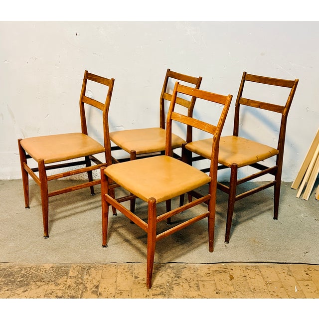 4 Gio Ponti chairs for Amedeo Cassina, first series, signed underneath, coming from the Vatican State This piece has an...