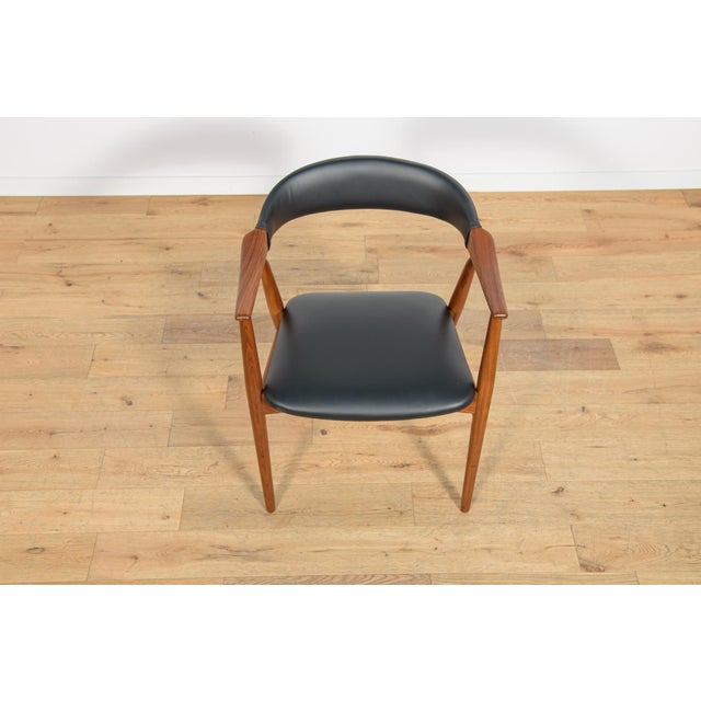 Designed by Th. Harlev for Farstrup Møbler in Denmark, circa 1960. The interior has been changed. Covered with new black...