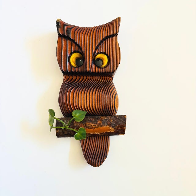 A wonderful mid century sculptural wall hanging, carved out of wood to create a cute owl sitting on a branch. Ready to...