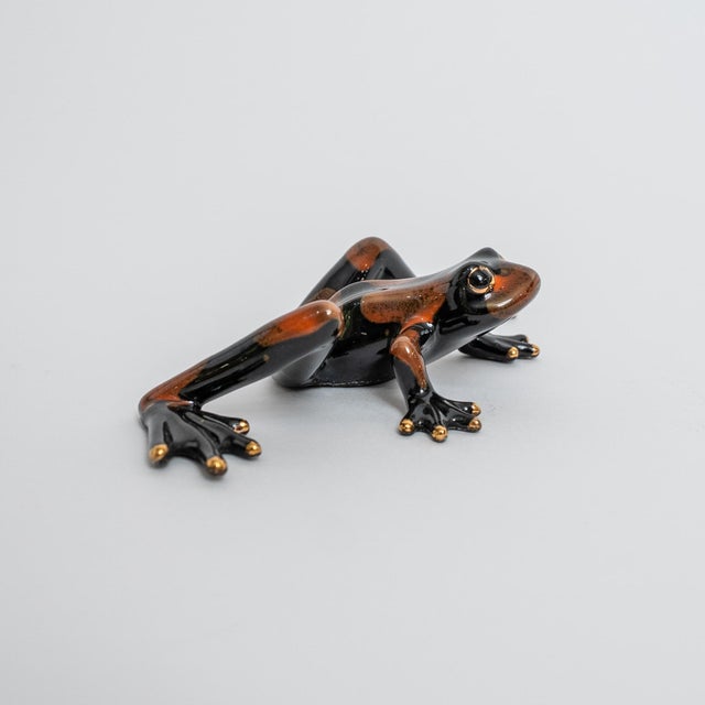 Whimsical tree frog sculpture inspired by the playful, expressive style of Tim “Frogman” Cotterill. The piece features...