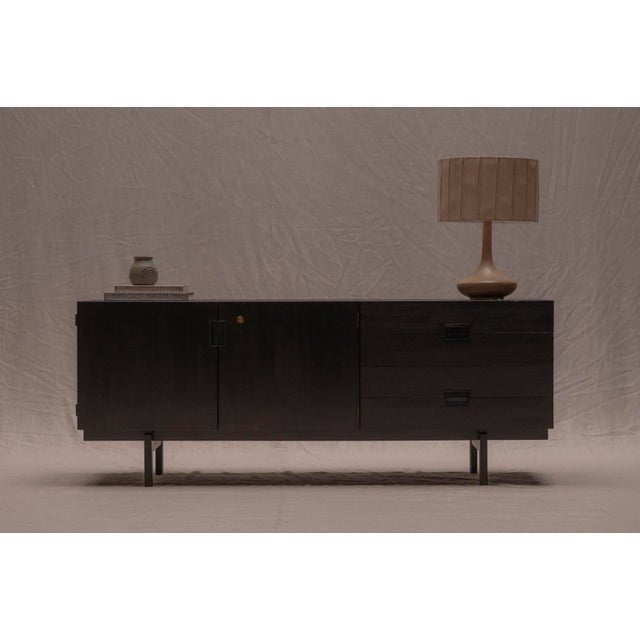 A stunning and rare black example of the iconic Japanese Series sideboard designed by Cees Braakman for UMS Pastoe in the...
