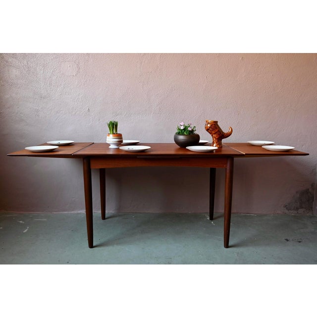 This lovely table is a beautiful example of the understated elegance of Scandinavian design. The warm hue of the teak is...