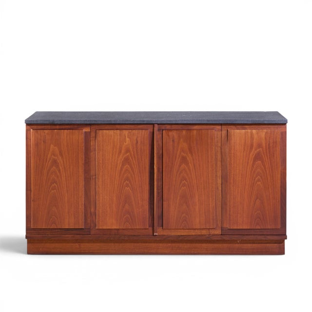 Jack Cartwright for Founders Mid Century Walnut and Slate Top Credenza This credenza measures: 48 wide x 16 deep x 25.25...