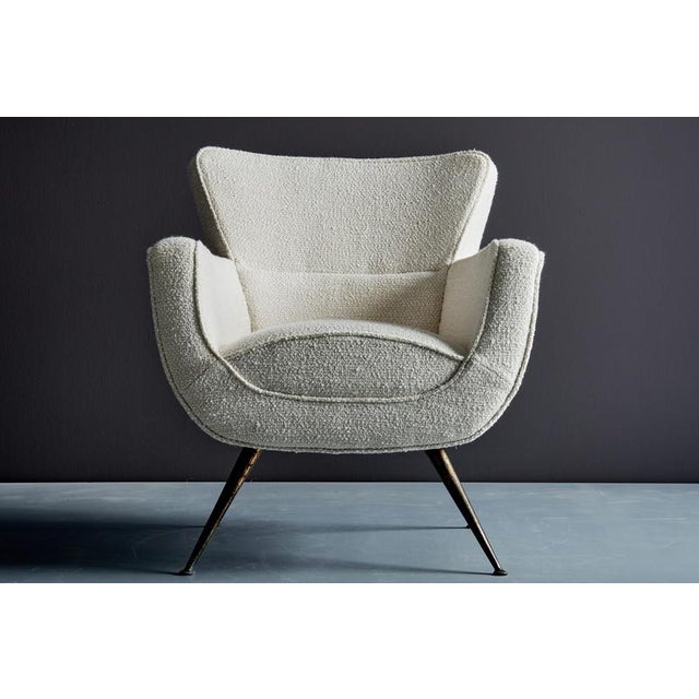 Elegant 1950s lounge chair designed by Henry Glass, featuring a sculptural upholstered form with distinctive angled...