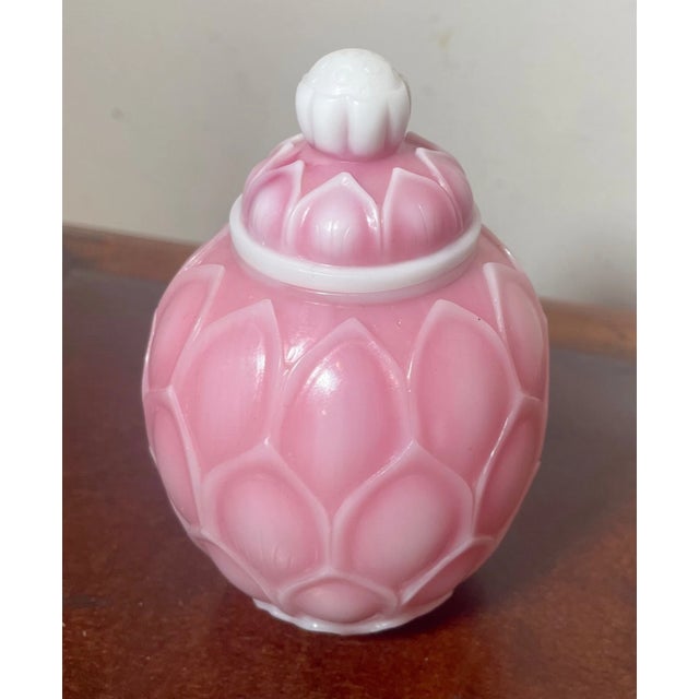 Up for sale is a rare antique Chinese handmade peking glass jar. It's sculpted out of a white to pink peking glass into a...