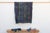 A masterwork of Malian textile heritage featuring deep indigo saturation and symbolic geometric motifs. Originating from...