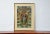 A framed Indian ceremonial Hindu deity from the mid 20th century, hand-painted on canvas. Created in India during the...