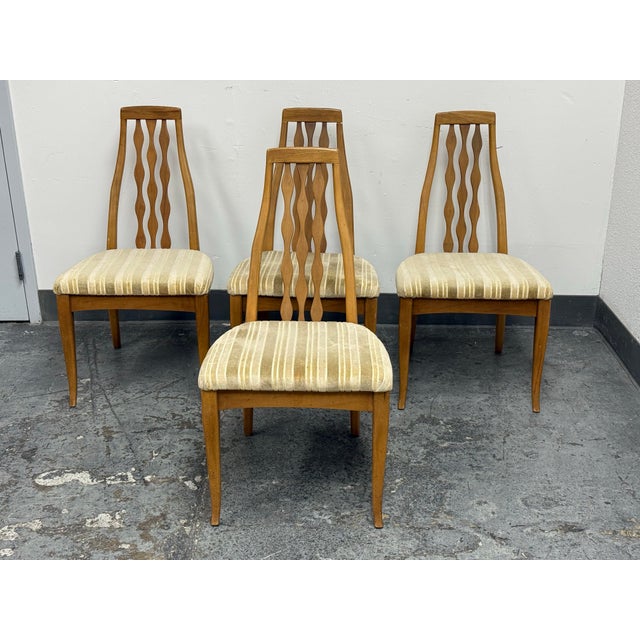Design Plus Gallery presents a set of four Mid-Century Modern Dining Chairs from American of Martinsville. Dating to...