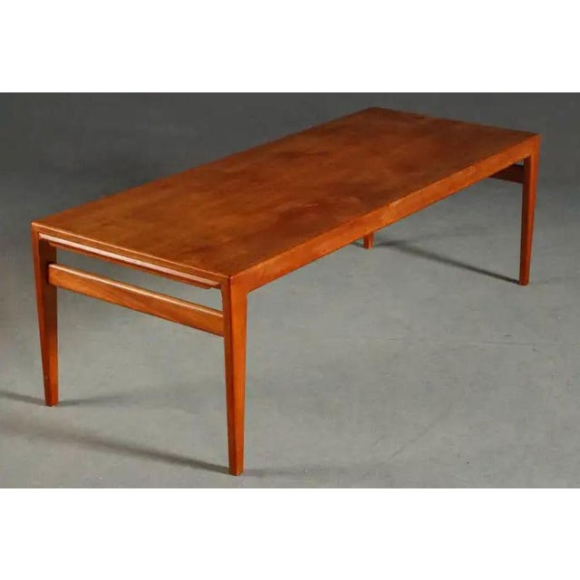 Fully Restored Danish Johannes Andersen Coffee Table in Teak by CFC Silkeborg,1960s The table feature a slimlined...