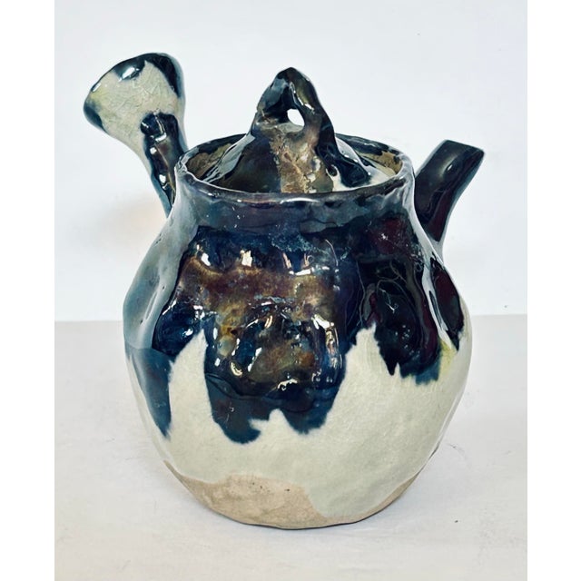 Japanese wabi sabi ceramic individual teapot with trumpet shaped handle and strainer spout. Can also be used as a soy...