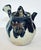 Japanese wabi sabi ceramic individual teapot with trumpet shaped handle and strainer spout. Can also be used as a soy...