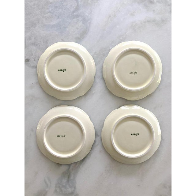 Add a pop of mid-century charm to your table with this set of 4 Lenwile Ardalt Artware saucers, featuring a lively lime...