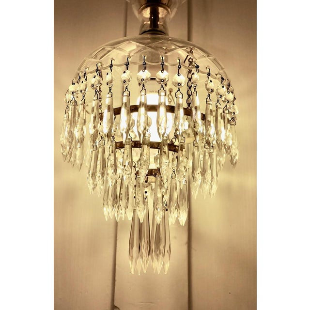 Large French Waterfall Crystal Chandelier. This is a very pretty crystal chandelier, the top has an etched Glass Dome. The...