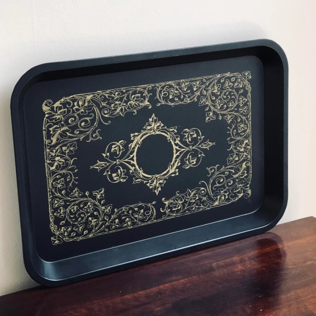 Offering a beautiful late 20th century black & gold tole tray with elegant classical scrollwork. A nice deep tray --...