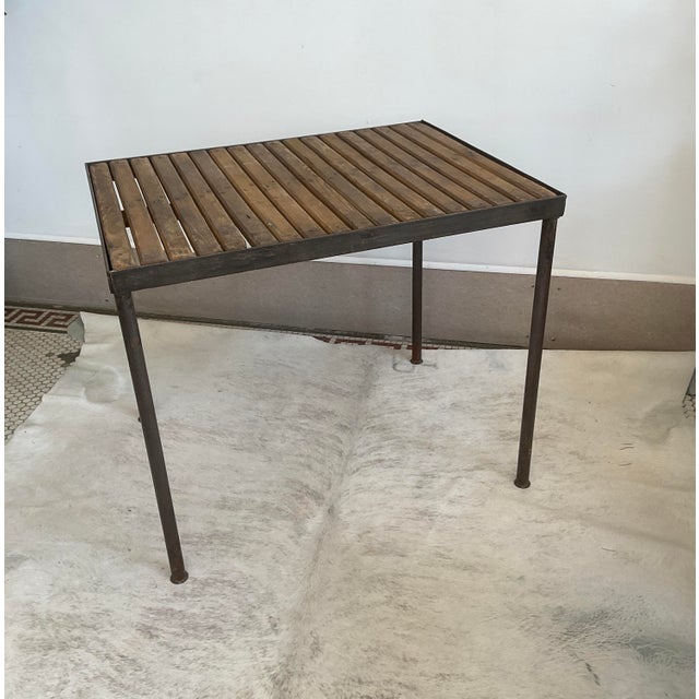 Bring character and utilitarian charm to your space with this vintage industrial side table. Featuring a sturdy, clean-...