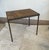 Bring character and utilitarian charm to your space with this vintage industrial side table. Featuring a sturdy, clean-...
