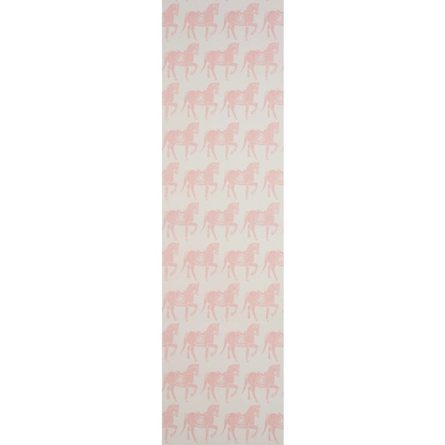 Whimsical horses—inspired by a rare Rajasthani breed—parade across this wallcovering, capturing the handmade style of a...