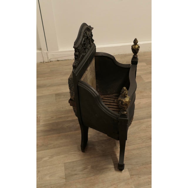 A Large Regency Iron Fire Grate The fire has a decorative high back, in front there is a large fire basket which is in...