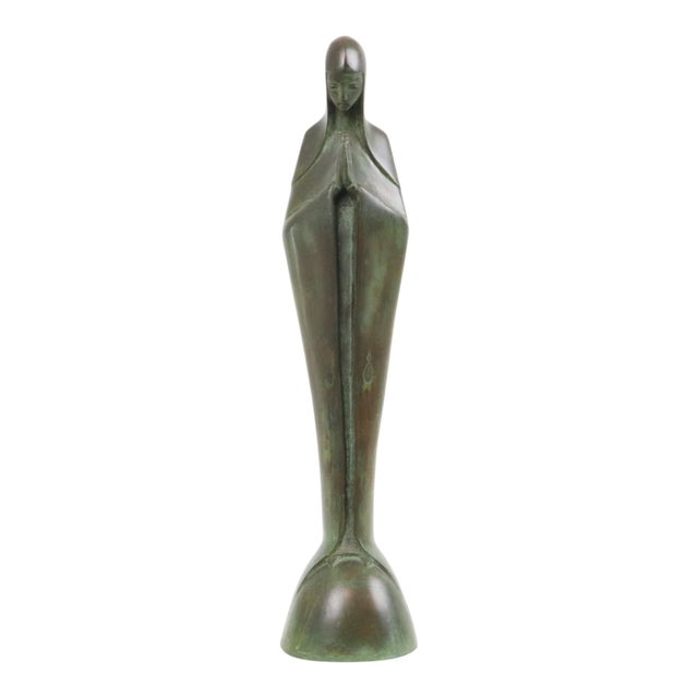Rare statue of the Virgin Mary, crafted from bronze with a green and brown patina. It is signed “Zonnewende” on the back...
